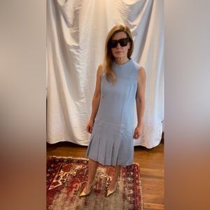 Akris “Punto” exclusive NWT light blue sleeveless dress with bottom pleat.